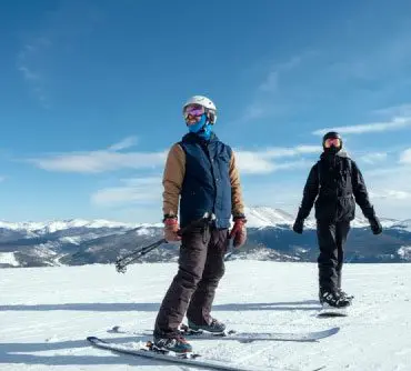 Beginner skiers on their first ski holiday in the French Alps