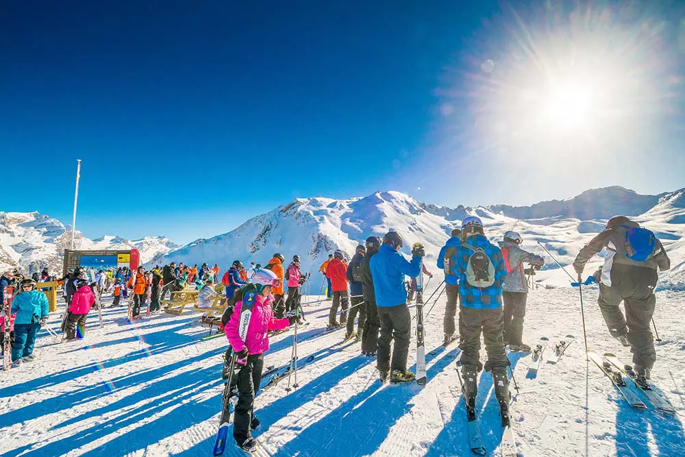 Beginner skiers on their first ski holiday in the French Alps